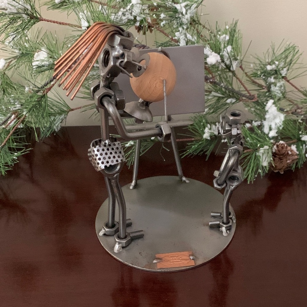 📌 Nuts and Bolts Sculpture Female Teacher With A Globe Figurine